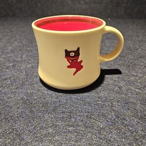 Cream Mug with Red Interior and Unique Design